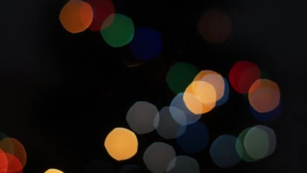 Luzes coloridas bokeh no fundo preto. Panela — Vídeo de Stock