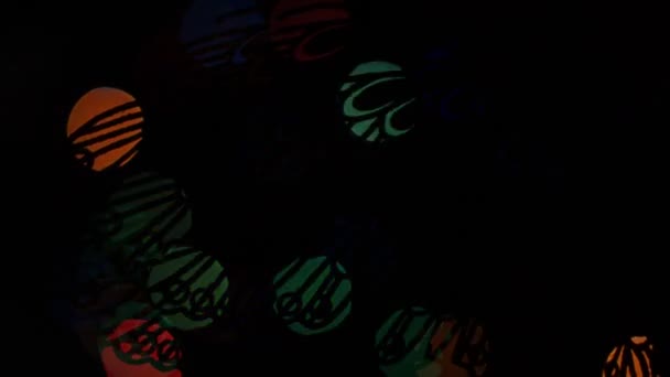 Butterfly lights bokeh on black background. Shape — Stock Video