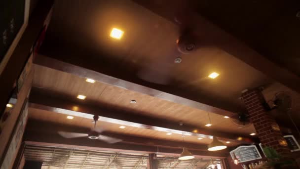 A big cooling ceiling fanin cafe — Stock Video