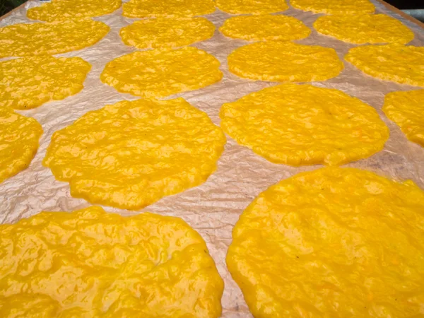 mango sheet (dried mango paste) on plastic for sunburn.