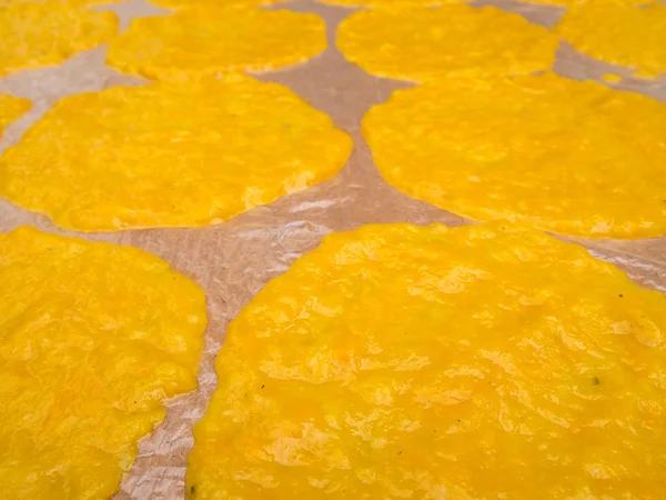 mango sheet (dried mango paste) on plastic for sunburn.