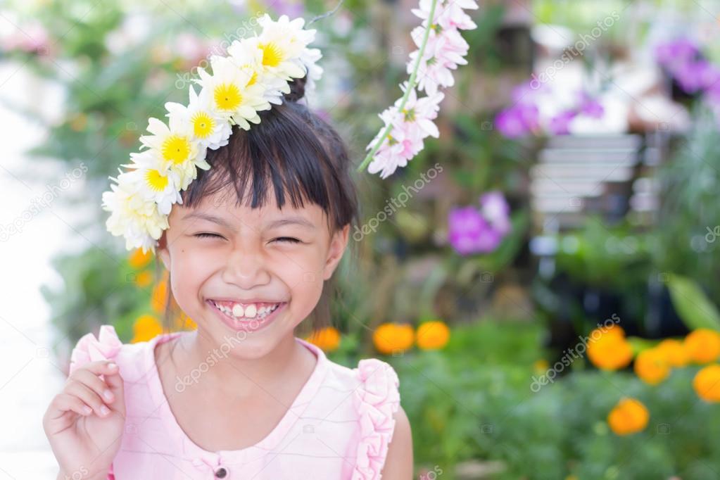 Portrait of happy joyful smiling beautiful little asian kid
