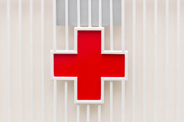 The red cross mark on the slide door