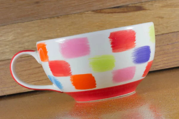 Coffee mug on the wooden background — Stock Photo, Image