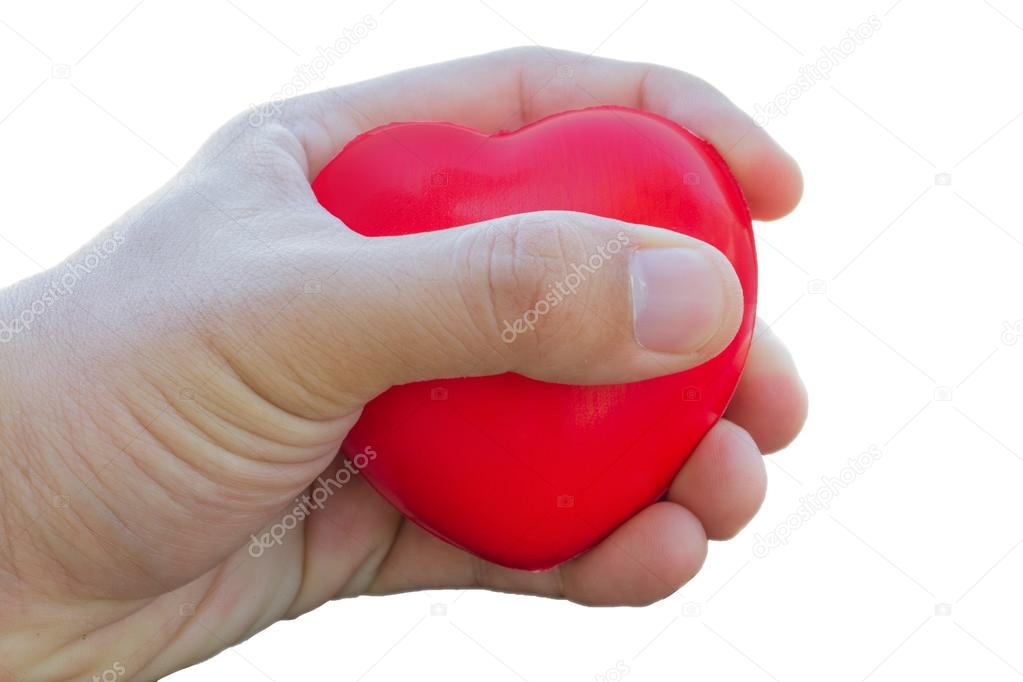 Big red heart in the hand on white background