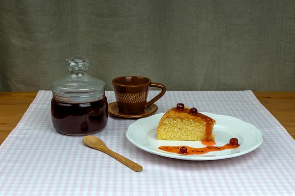 Glass jar with gooseberry jam and homemade biscuit — Stock Photo, Image