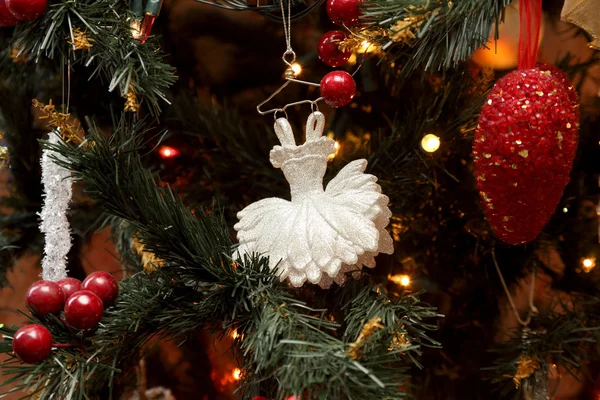 Decorations and festive toys on the christmas tree — Stock Photo, Image