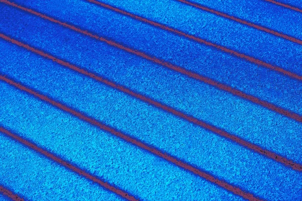 Texture blu brillante della superficie in calcestruzzo con strisce — Foto Stock