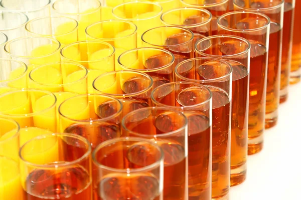 Many glasses with different juice — Stock Photo, Image