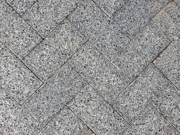 Gray street paving slabs. texture background abstraction
