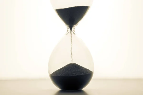 Hourglass Light Background Time Money Business Solutions Time — Stock Photo, Image