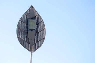 Modern LED street lamp against the sky. Electrical industr