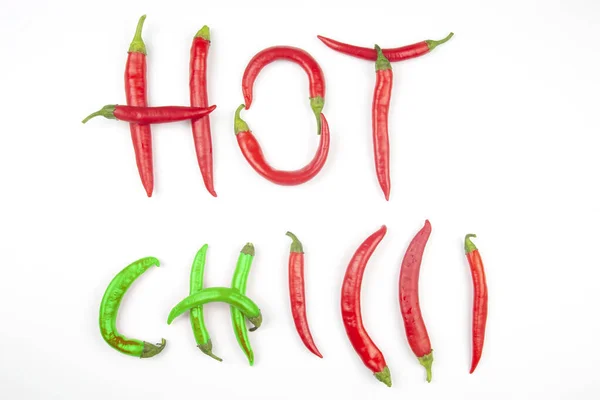 Красный Острый Перец Чили Выстелен Буквами Белом Фоне Витаминные Овощи — стоковое фото