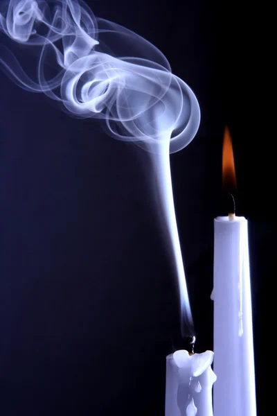 Burning and extinguished the candles — Stock Photo, Image