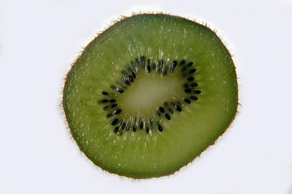 Cortar en medio kiwi —  Fotos de Stock