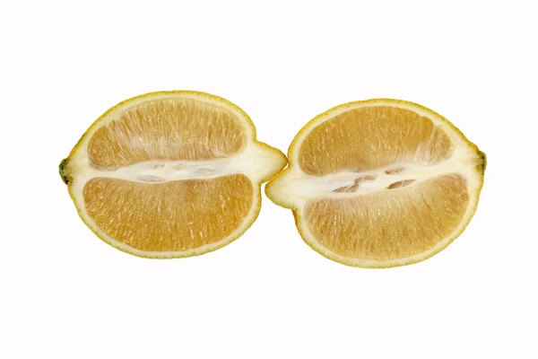 Cut along the two halves of a lemon on a white background — Stock Photo, Image