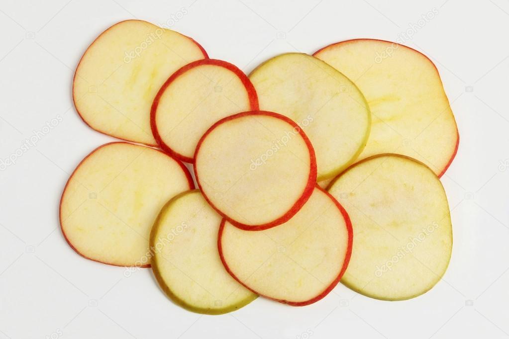 thinly sliced Apple on white background