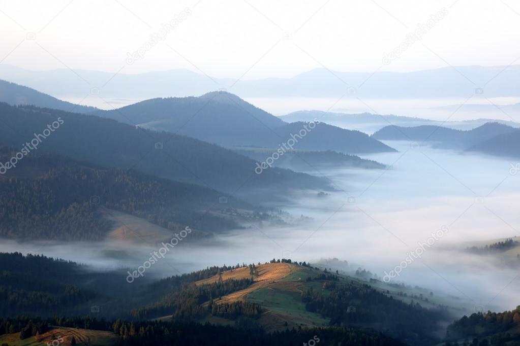 mountains in the mist before sun dawn