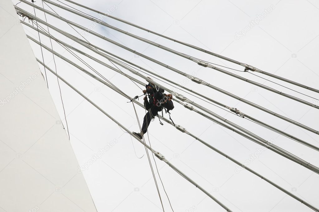 industrial climber at the altitude of assembling