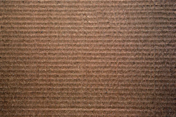 A papírdoboz textúráját barna színben — Stock Fotó
