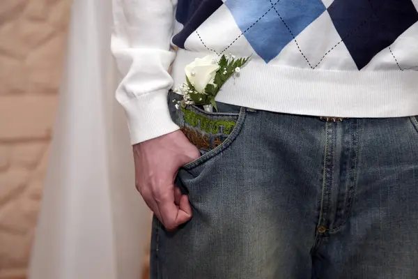 A friend of the groom with the wedding flower — Stock Photo, Image