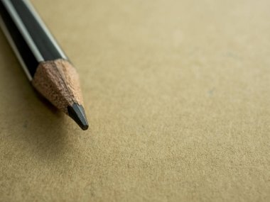 Pencil on cover book with copy space for text.