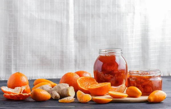 Tangerine Kumquat Jam Glass Jar Fresh Fruits Black Wooden Table — Stock Photo, Image