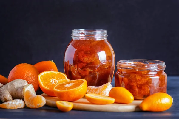 Tangerine Kumquat Jam Glass Jar Fresh Fruits Black Wooden Table — Stock Photo, Image