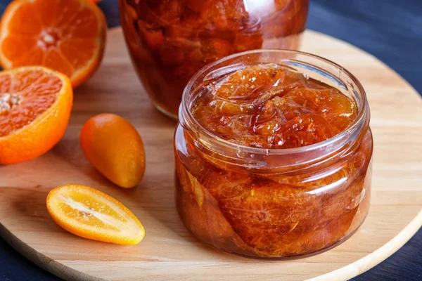 Tangerine Kumquat Jam Glass Jar Fresh Fruits Black Wooden Table — Stock Photo, Image
