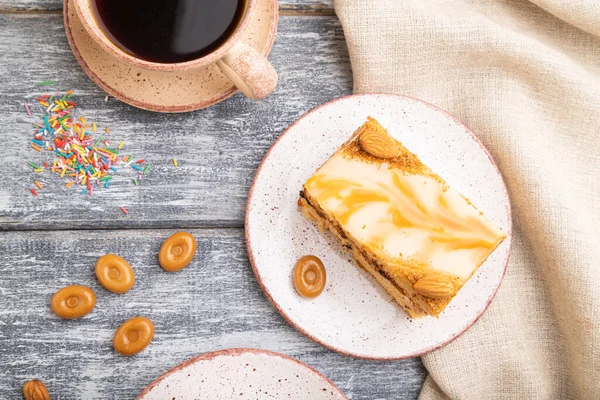 Honey Cake Milk Cream Caramel Almonds Cup Coffee Gray Wooden — Stock Photo, Image