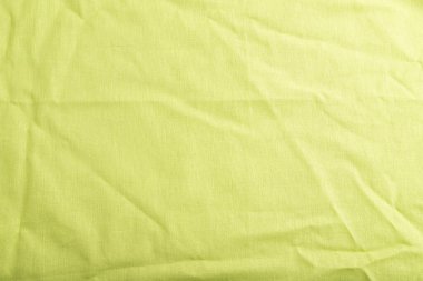 Pürüzsüz yeşil keten doku parçası. Üst görünüm, düz görünüm, doğal tekstil arkaplan ve doku.