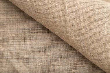 Kaba keten dokusu parçası. Yan görünüm, doğal tekstil arkaplan ve doku.
