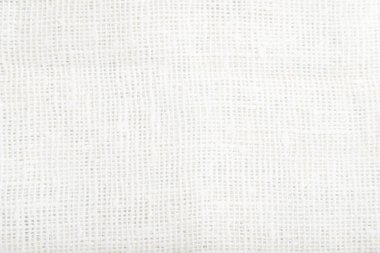 Pürüzsüz beyaz keten doku parçası. Üst görünüm, düz görünüm, doğal tekstil arkaplan ve doku.
