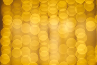 Sarı halkalar çelenklerden yana. Sihir etkisi. Noel fotoğrafı. Güzel arkaplan