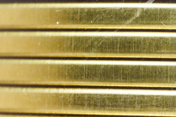 Teneke kutular için çelik kapaklar. Makro etkisi. Güzel arka plan. Altın arka plan. Yüksek kalite fotoğraf