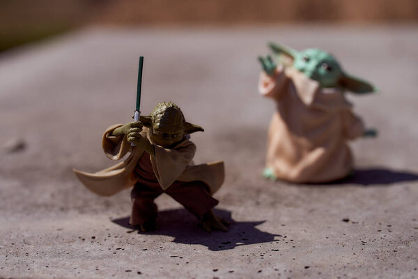 May, 2021: Display of master Yoda and Baby Yoda, an action figures. Star Wars