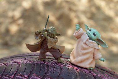 May, 2021: Display of master Yoda and Baby Yoda, an action figures. Star Wars. High quality photo clipart