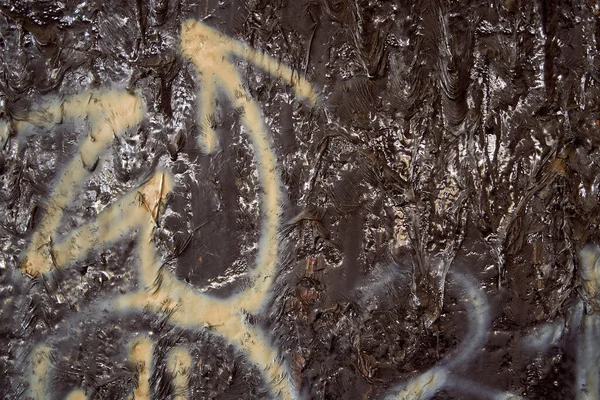 View of the molten wall of black resin — Stock Photo, Image