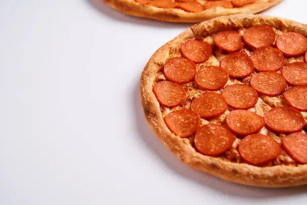 Pizza with sausages pepperoni on a white background. Top view.Very high quality photo. — Stock Photo, Image