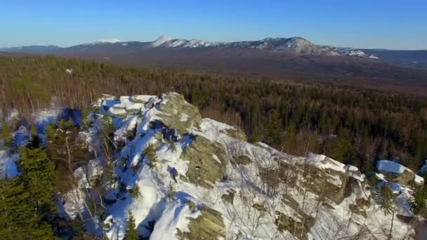 Aerial top of the world view of male mountain climber in winter — Stock Video
