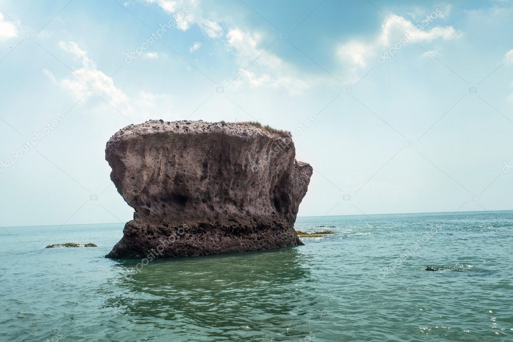 coral reef rock out of the water