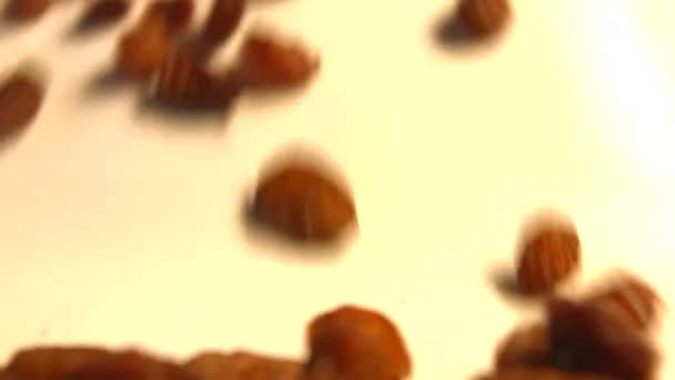 Raisins on a white background. 2 Shots. Horizontal pan. Close-up. — Stock Video