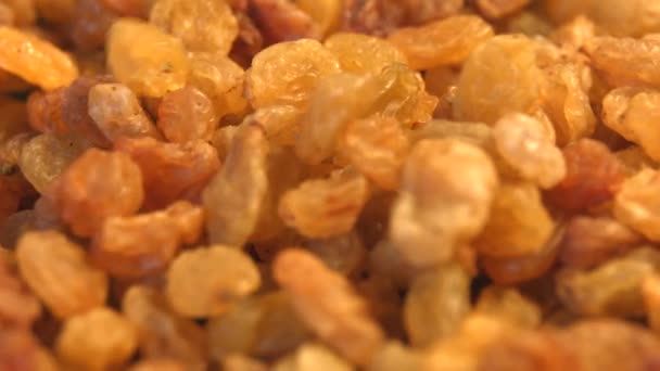 Raisins. 2 Shots. Horizontal and vertical pan. Slow motion. Close-up. — Stock Video