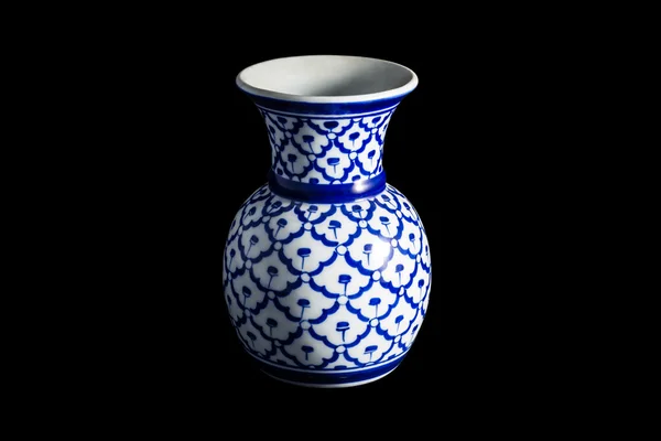 Vase on a traditional with isolated on black background. — Stock Photo, Image