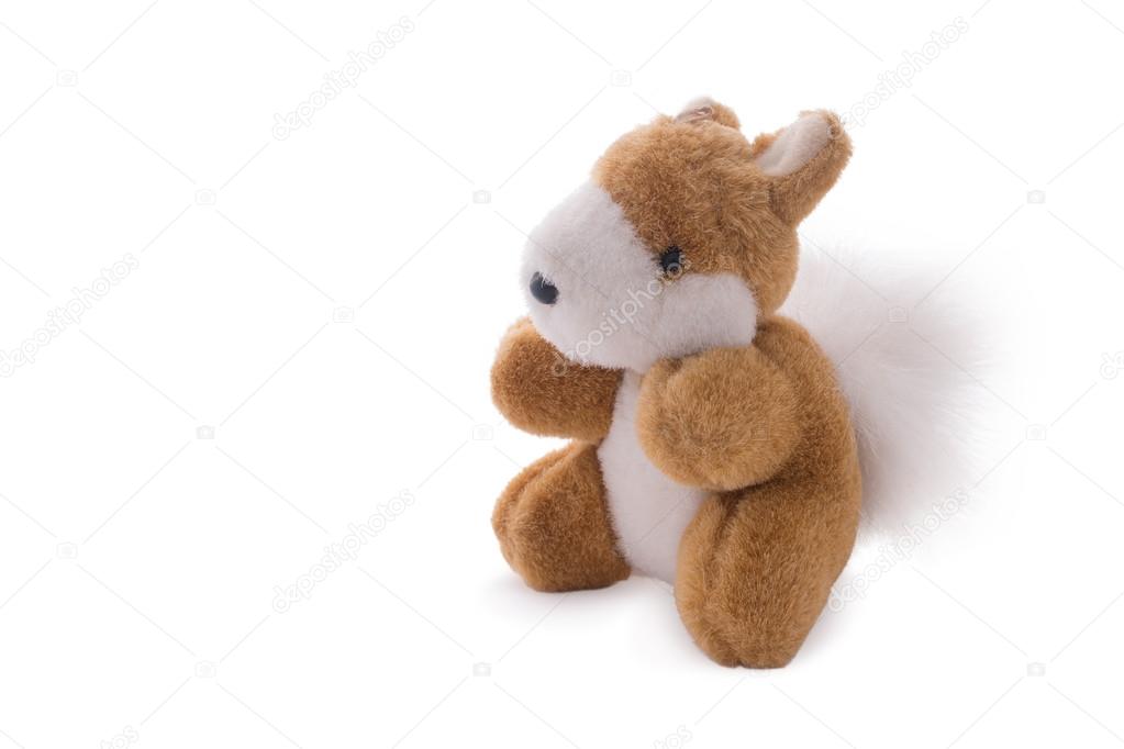 Squirrel toy doll isolated over white.