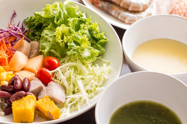 Mixed salad with tomatoes, corn, carrots, cantaloupe, red beans, — Stock Image Mixed salad with tomatoes, corn, carrots, cantaloupe, red beans, Stock Photo