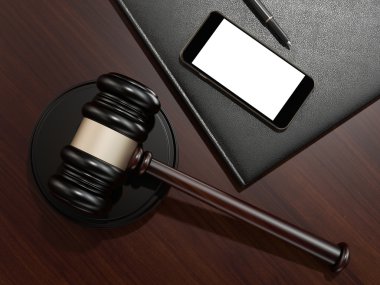 Wooden judges gavel and phone on the brown wooden background  clipart