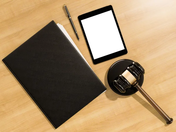 Wooden judges gavel and tablet computer on the wooden background — Stock Photo, Image