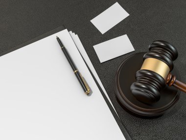 Wooden judges gavel, business cards on black leather desk