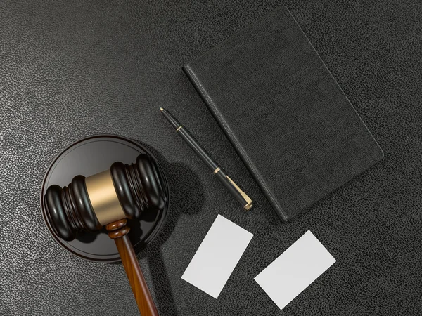 Wooden judges gavel and notebook, business cards on black leather desk — Stockfoto